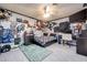 Spacious bedroom with playful decor, a ceiling fan, and plenty of room for furniture at 224 Catalini St, Las Vegas, NV 89107