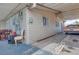The covered patio offers dining space and ample storage on the side of the home at 224 Catalini St, Las Vegas, NV 89107