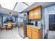 Cozy kitchen with stainless steel refrigerator and breakfast area at 224 Catalini St, Las Vegas, NV 89107