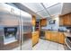 Bright kitchen featuring a stainless steel refrigerator and ample counter space at 224 Catalini St, Las Vegas, NV 89107