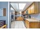 Well-lit kitchen featuring stainless steel appliances and ample cabinet space at 224 Catalini St, Las Vegas, NV 89107
