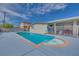 Sparkling pool offers a refreshing escape and complements the outdoor living space of this lovely home at 224 Catalini St, Las Vegas, NV 89107