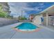 Inviting backyard pool is surrounded by ample patio space, adjacent to the home, perfect for hot summer days at 224 Catalini St, Las Vegas, NV 89107