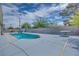 Refreshing pool is the centerpiece of the backyard, surrounded by a spacious patio area at 224 Catalini St, Las Vegas, NV 89107