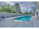 Inviting backyard pool is surrounded by ample patio space for entertaining, perfect for hot summer days at 224 Catalini St, Las Vegas, NV 89107
