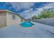 Private backyard pool offers a serene retreat, framed by the home and mature greenery at 224 Catalini St, Las Vegas, NV 89107