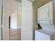 Stackable washer and dryer in a laundry closet at 23 E Agate Ave # 207, Las Vegas, NV 89123