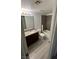 Standard bathroom with a single sink, granite countertop, and a shower/tub combo at 2606 S Durango Dr # 142, Las Vegas, NV 89117