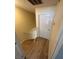 Upper level hallway shows railing overlooking the staircase and a closet at 2655 Aracatuba Ave, Las Vegas, NV 89121