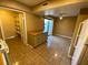 Galley kitchen featuring tile flooring at 2655 Aracatuba Ave, Las Vegas, NV 89121