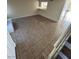 Bright living room leading to a partial staircase at 2655 Aracatuba Ave, Las Vegas, NV 89121