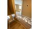 Modern staircase features wood floors, natural light, and a white railing at 2655 Aracatuba Ave, Las Vegas, NV 89121