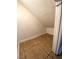 Unique home storage space under eaves shows tile floors and white walls at 2655 Aracatuba Ave, Las Vegas, NV 89121