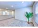 Spacious loft with plush carpeting, bright and airy, and ready for personalized design at 2728 Tricase St, Henderson, NV 89044