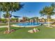 Community splash pad offers fun for everyone, surrounded by lush landscaping and inviting play areas at 2728 Tricase St, Henderson, NV 89044