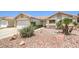 Charming single-story home with desert landscaping, attached garage, and neutral color palette at 2738 Sandalwood Ave, Henderson, NV 89074