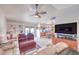 Inviting living room with cozy seating, built-in shelves, and an open floor plan at 2738 Sandalwood Ave, Henderson, NV 89074