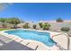 Backyard pool surrounded by lush landscaping, offering a private outdoor retreat at 2738 Sandalwood Ave, Henderson, NV 89074