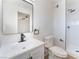 Modern bathroom with a sleek vanity, black hardware, and walk-in shower at 2878 El Cajon St, Las Vegas, NV 89169