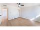 The bedroom features wood-look floors, a ceiling fan, and a closet at 2878 El Cajon St, Las Vegas, NV 89169