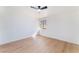 Relaxing bedroom featuring light wood-look flooring and bright natural light at 2878 El Cajon St, Las Vegas, NV 89169