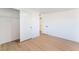 Bedroom with light wood-look flooring, closet, and natural light from a window at 2878 El Cajon St, Las Vegas, NV 89169