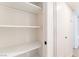 The walk-in closet features built-in shelving to optimize storage space in this house at 2878 El Cajon St, Las Vegas, NV 89169