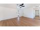 This airy living room boasts natural light, a neutral color palette, and hardwood flooring at 2878 El Cajon St, Las Vegas, NV 89169