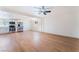Expansive living area showcases hardwood floors and a kitchen with stainless appliances at 2878 El Cajon St, Las Vegas, NV 89169