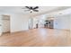 Spacious living room boasts hardwood floors, a ceiling fan, and ample natural light at 2878 El Cajon St, Las Vegas, NV 89169