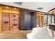 Stunning bathroom boasts a soaking tub and floor-to-ceiling waterfall feature, creating a spa-like retreat at 3004 Astoria Pines Cir, Las Vegas, NV 89107