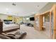 Large bedroom with sitting area, desk, and ensuite bathroom at 3004 Astoria Pines Cir, Las Vegas, NV 89107