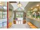 Elegant foyer with marble floors, neutral walls, recessed lighting, and views to the backyard and living room at 3004 Astoria Pines Cir, Las Vegas, NV 89107