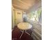 Enjoy the outdoors on this enclosed private balcony with a round table and overhead awning at 3101 Casey Dr # 204, Las Vegas, NV 89120