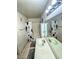 Standard bathroom featuring a shower-tub combo, vanity, and neutral tile flooring at 3101 Casey Dr # 204, Las Vegas, NV 89120