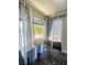 Elegant dining area featuring a marble table, stylish chairs, and large windows that bring in natural light at 3101 Casey Dr # 204, Las Vegas, NV 89120