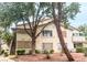 Charming multi-level condo with a classic stucco exterior and mature landscaping at 3101 Casey Dr # 204, Las Vegas, NV 89120