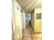 Hallway leads into living space with tile flooring and neutral colored walls at 3101 Casey Dr # 204, Las Vegas, NV 89120