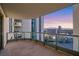 This expansive balcony offers stunning city views and sleek glass railings at 322 Karen Ave # 2501, Las Vegas, NV 89109