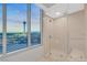 Bright bathroom with a glass shower, and a stunning view of the Stratosphere at 322 Karen Ave # 2501, Las Vegas, NV 89109