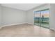 Bright bedroom with city views from a large window and neutral flooring at 322 Karen Ave # 2501, Las Vegas, NV 89109