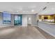 Open living space connecting kitchen with granite countertops and views to the city at 322 Karen Ave # 2501, Las Vegas, NV 89109