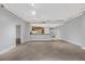 Bright, open living space features tile flooring, modern lighting, and a seamless flow into the adjacent kitchen at 322 Karen Ave # 2501, Las Vegas, NV 89109