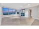 Large living room with city views, neutral walls, and sliding glass doors to balcony at 322 Karen Ave # 2501, Las Vegas, NV 89109