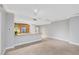 An open floor plan featuring recessed lighting and tiled floors adjoins a kitchen with stainless steel appliances at 322 Karen Ave # 2501, Las Vegas, NV 89109