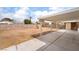 Large backyard features a covered patio, a block wall, and plenty of room for recreation at 3309 Marionette Ave, Las Vegas, NV 89101