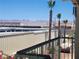 Scenic balcony view showcasing palm trees, distant mountains, and clear blue skies at 3550 Bay Sands Dr # 2070, Laughlin, NV 89029