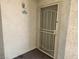Close-up of front door with secure metal screen, and unit number 2070 at 3550 Bay Sands Dr # 2070, Laughlin, NV 89029