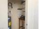 A utility room features wall-mounted shelves and a pegboard for optimal organization and storage solutions at 3550 Bay Sands Dr # 2070, Laughlin, NV 89029