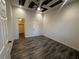 Bedroom featuring unique ceiling design, neutral walls and wood-look flooring at 3681 Melonies Dr # 29, Las Vegas, NV 89103
